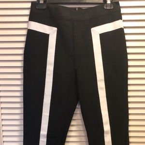 Black skinny leg dress pants w/white stripe design